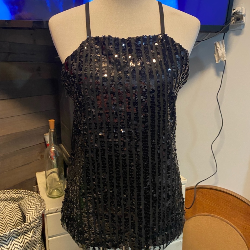 New w/o tags two never worn glam tank tops both size Lg price is each